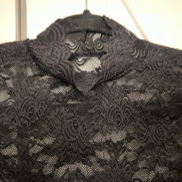 Black Lace long sleeve Top. Size: Med
Great condition; only worn one time. - Picture 4 of 8